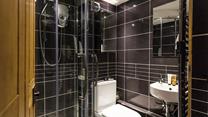 An additional shower room offers everyone extra space and privacy to get ready.