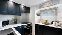Though compact, the kitchen is fabulously well-equipped with all you could need and more.