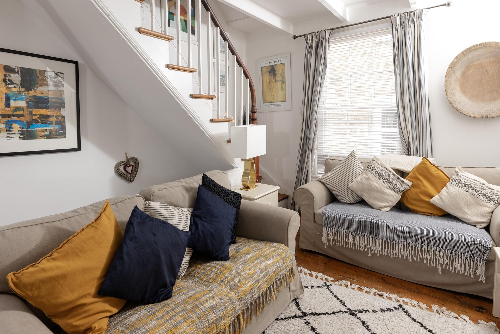 Blues, creams and pops of yellow evoke images of a day at the seaside.