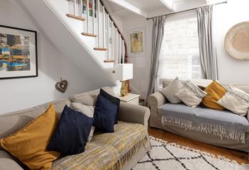 Blues, creams and pops of yellow evoke images of a day at the seaside.