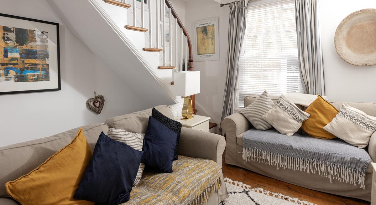 Blues, creams and pops of yellow evoke images of a day at the seaside.