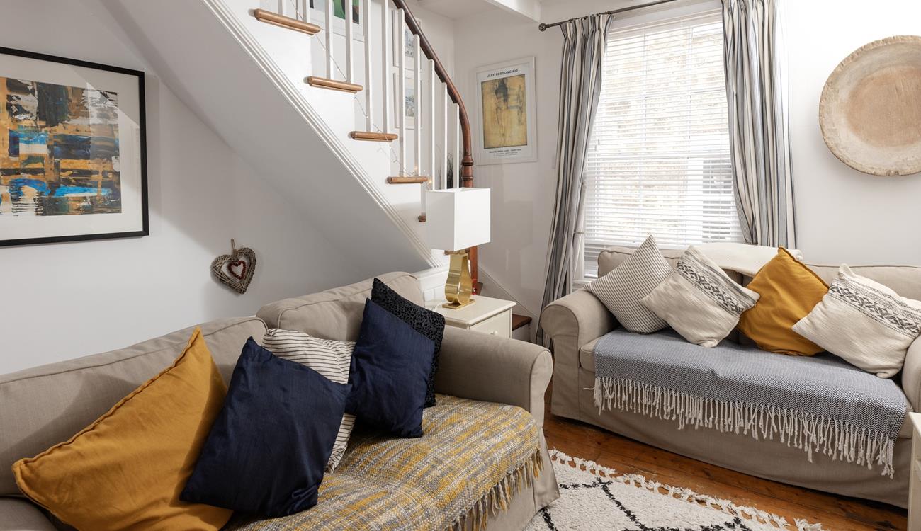 Blues, creams and pops of yellow evoke images of a day at the seaside.