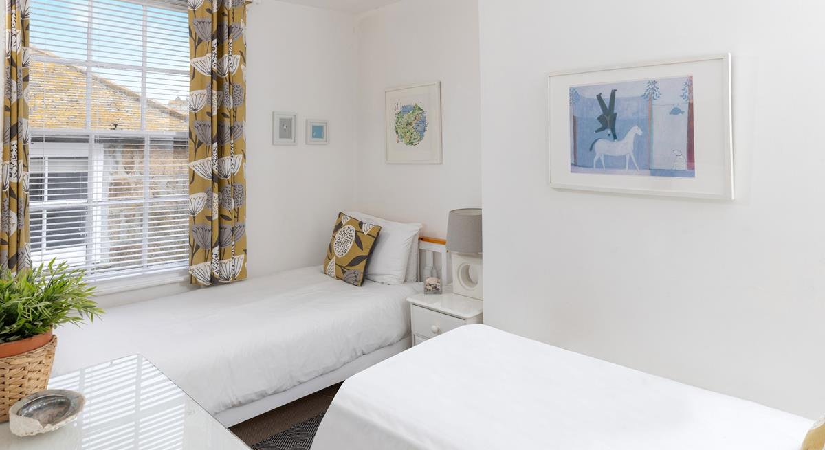 Twin beds are just as perfect for kids as they are for young adults.