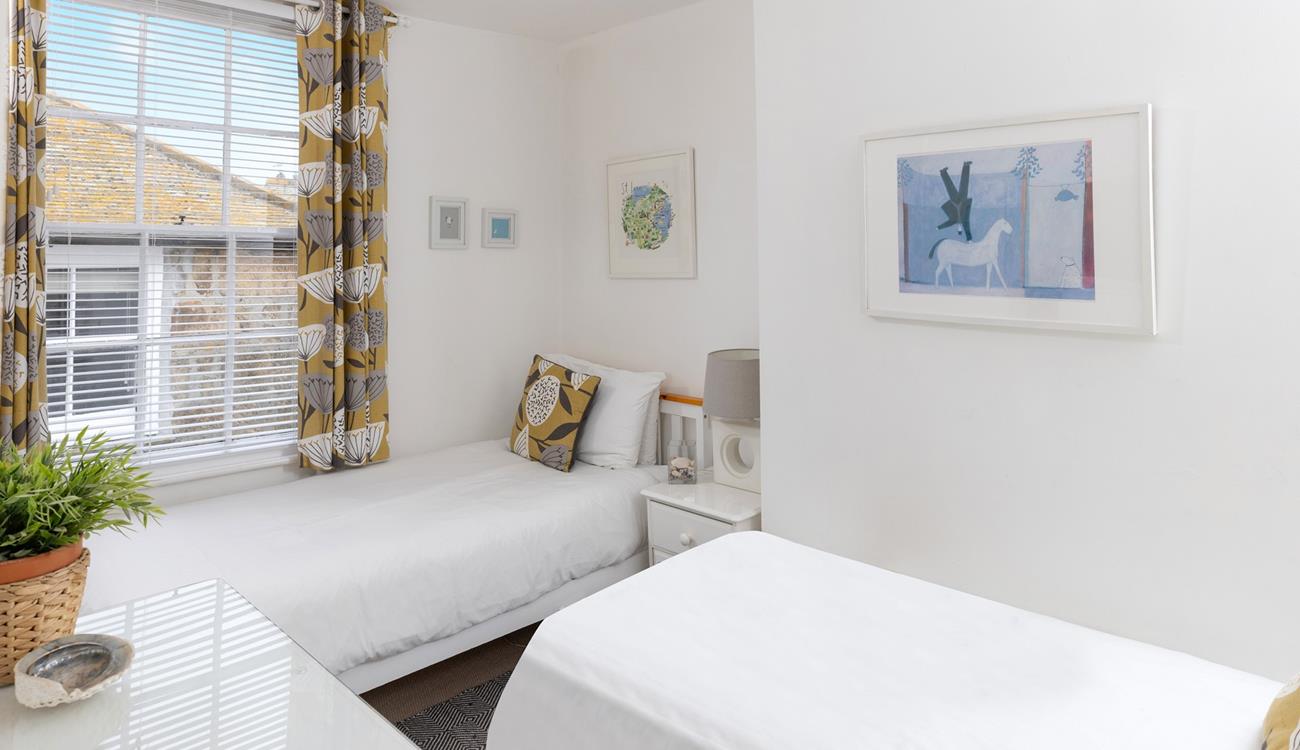 Twin beds are just as perfect for kids as they are for young adults.