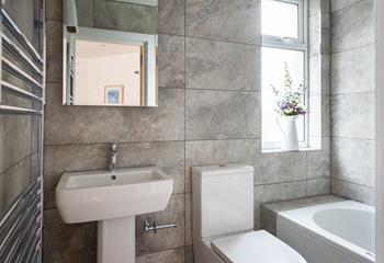 The gorgeous bathroom has been beautifully designed, giving it a luxurious feel.