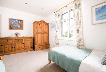 The spacious twin bedroom is perfect for both children or friends sharing.