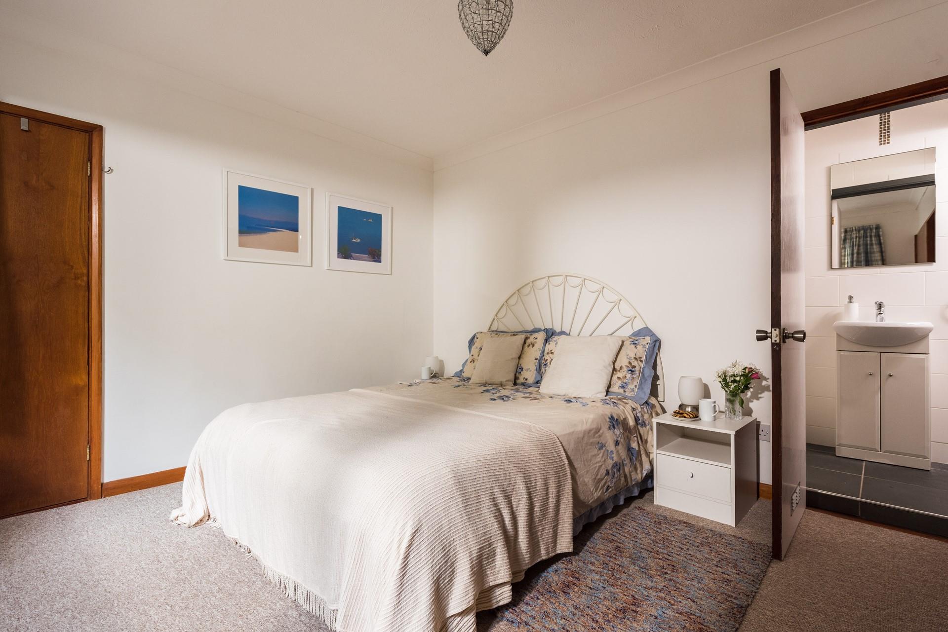 The main bedroom also benefits from an ensuite shower room. 