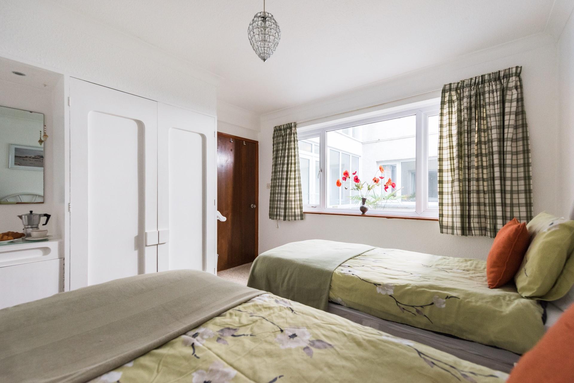 The twin room has plenty of storage for all your holiday essentials. 