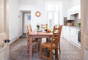 The kitchen has a country feel that welcomes you inside.