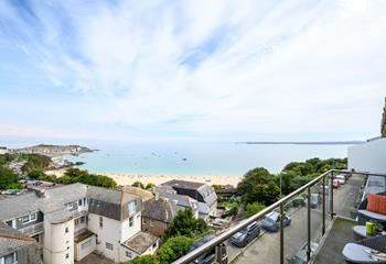 The full width balcony has panoramic views of Porthminster beach and beyond.