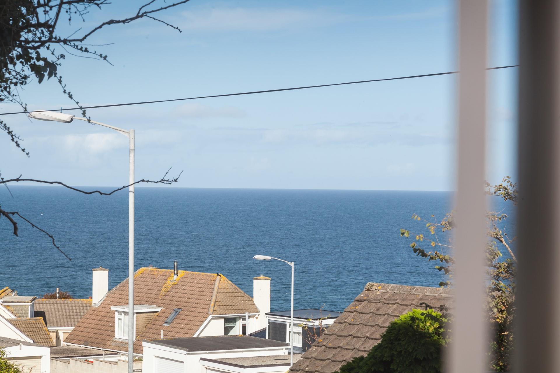 Get up early and watch the sunrise over the sea.