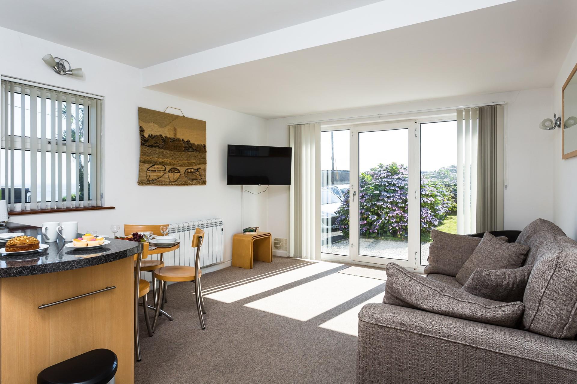 After a fun-filled day exploring St Ives, return home to snuggle up in the living space and watch a movie.