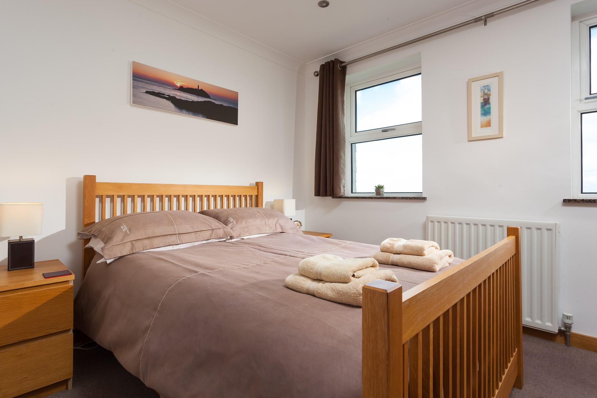 Classic furniture in the bedrooms and minimalistic decor have created a homely and calming space to relax in.