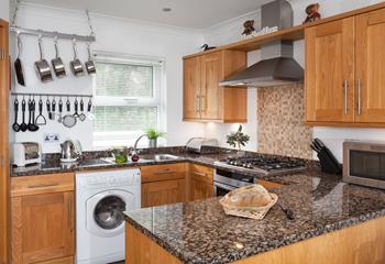 The kitchen is traditionally decorated and well-equipped.