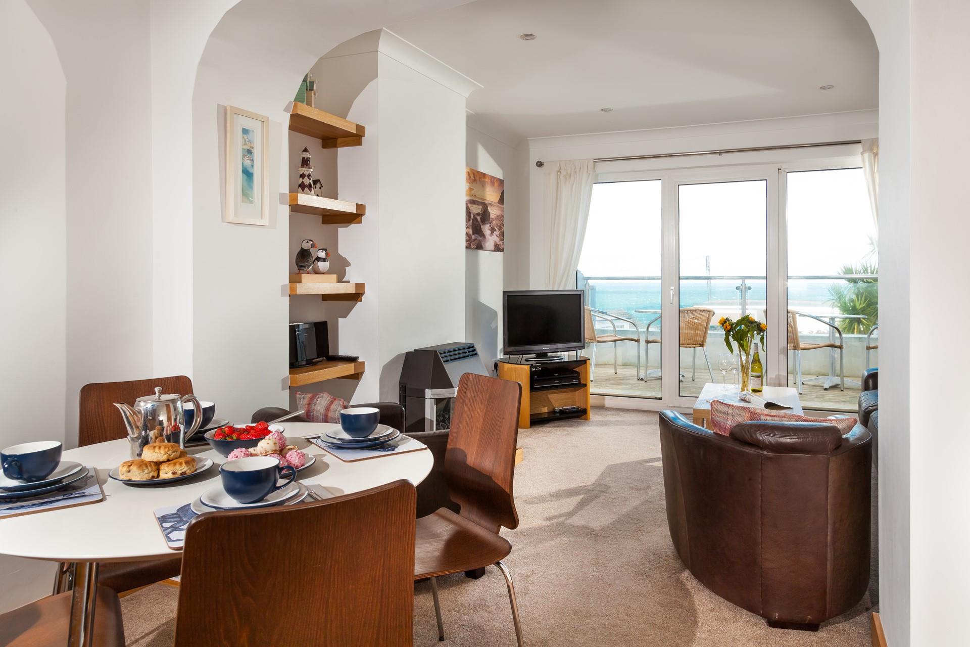 An open plan living space and large patio doors have created a wonderful light and airy space to socialise with your loved ones.