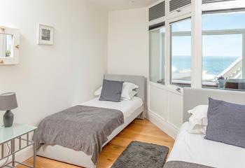 The twin bedroom boasts stunning sea views.