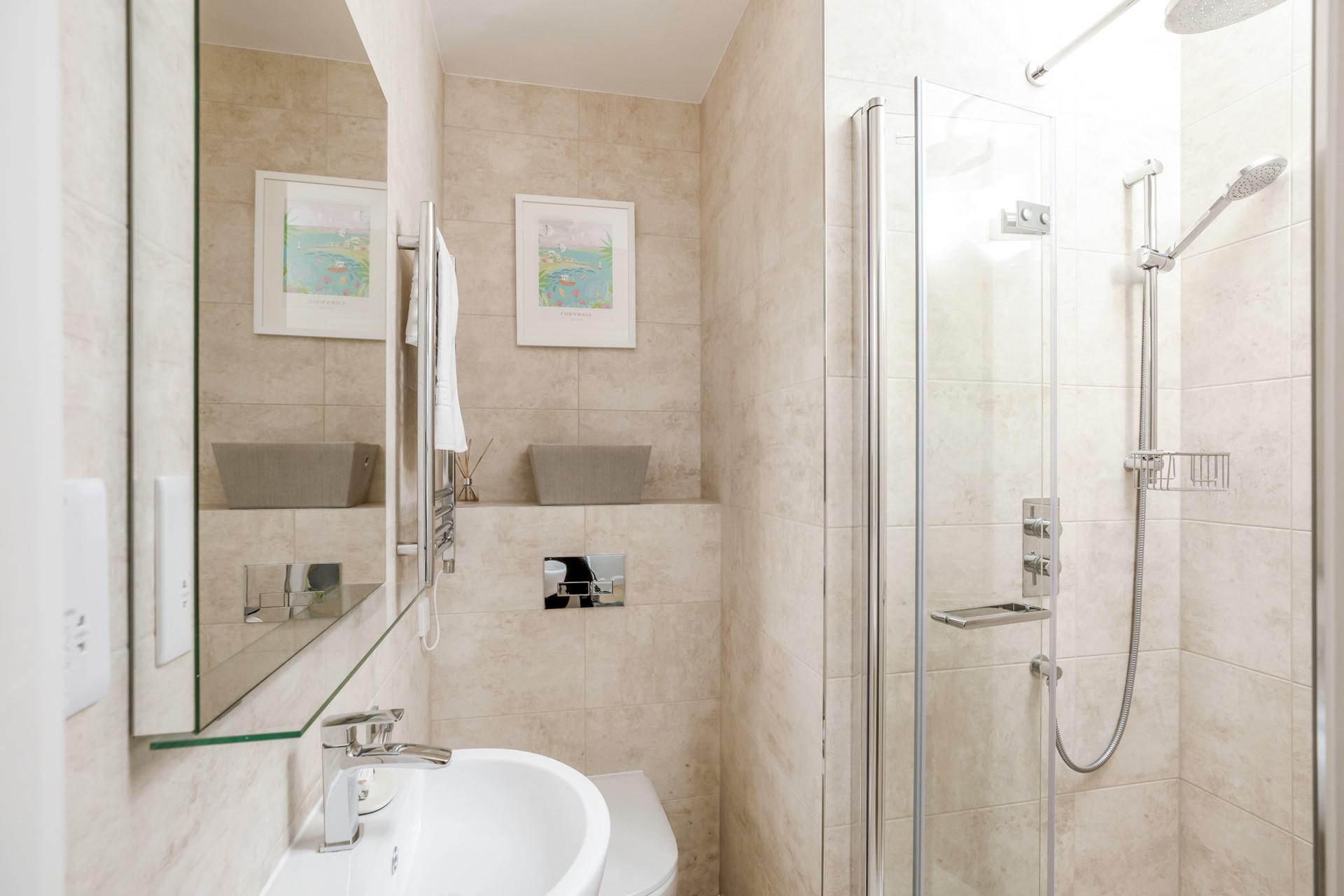 Step into the en suite shower and get ready for a day of exploring St Ives.