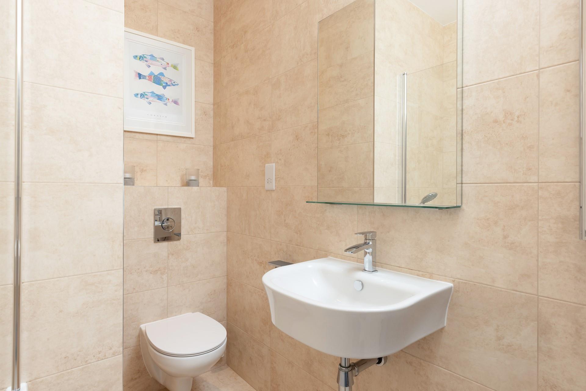 Get ready for an evening meal in the ensuite bathroom.
