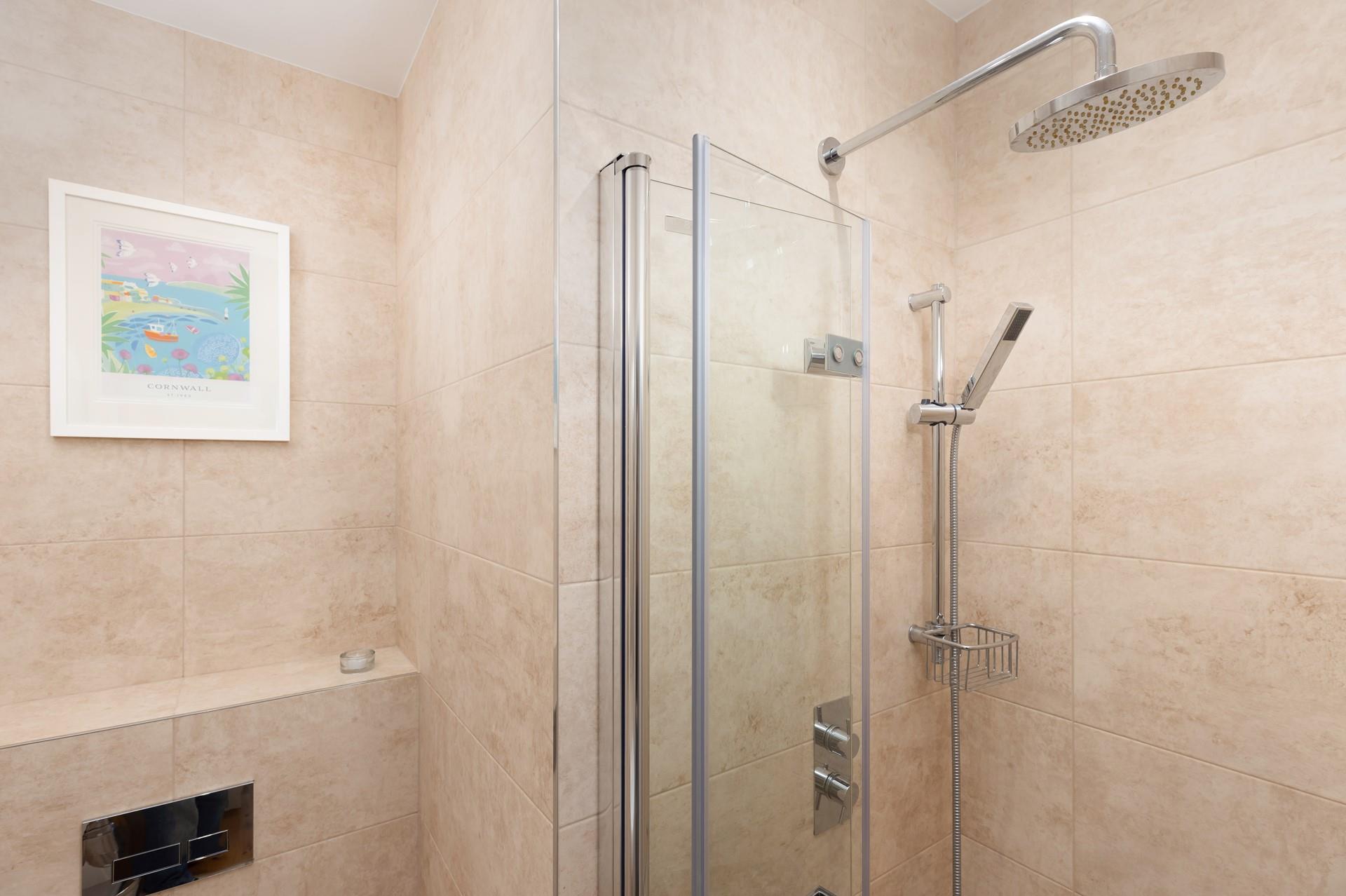 Step into the shower and wash away salt and sand. 