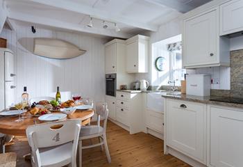 Spend time together in the open plan kitchen/dining area over meal times.