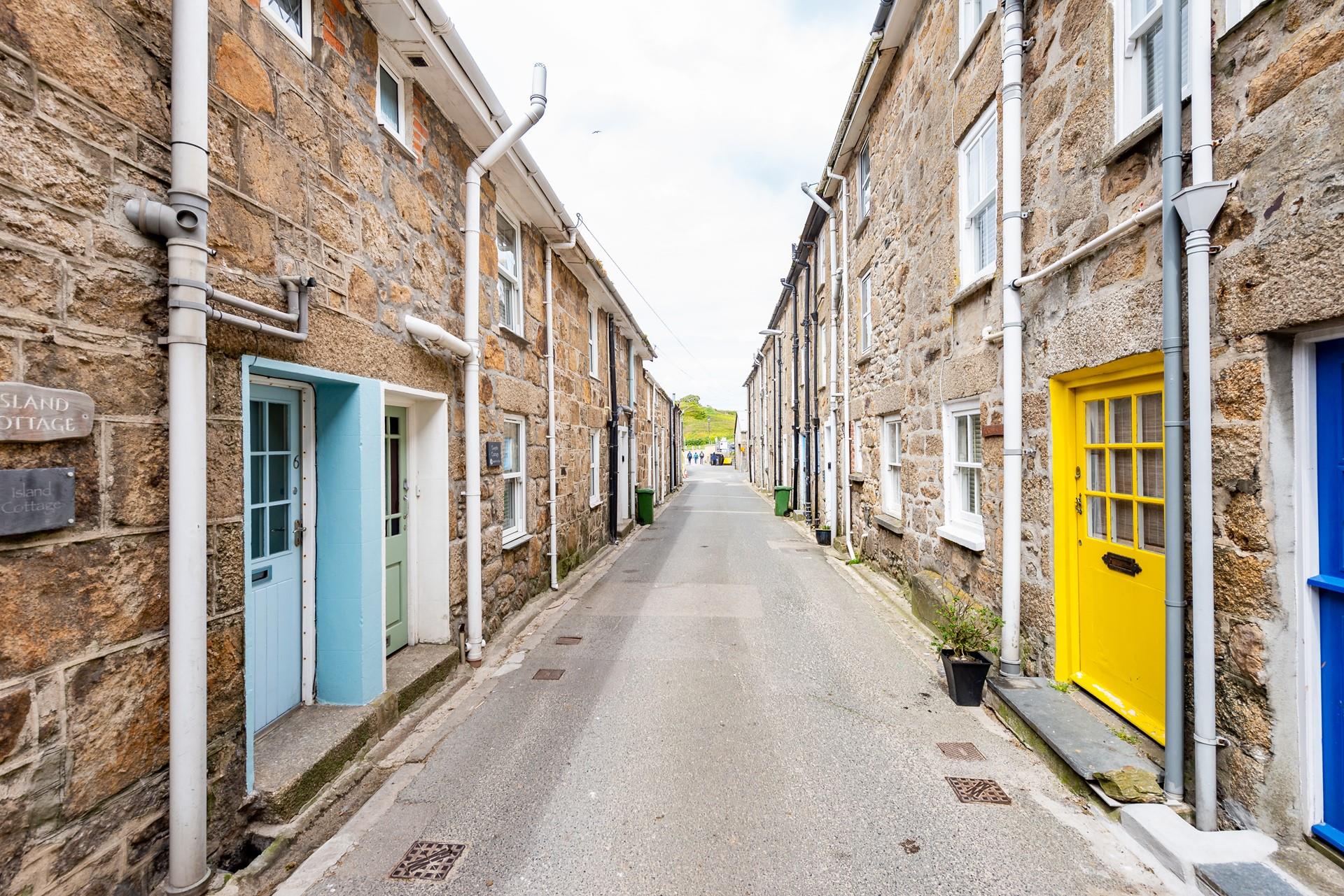 Step out the door and head down the road full of Cornish cottages to explore the shops in Fore Street.
