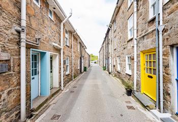 Step out the door and head down the road full of Cornish cottages to explore the shops in Fore Street.
