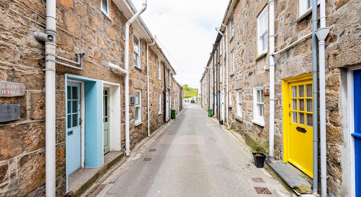 Step out the door and head down the road full of Cornish cottages to explore the shops in Fore Street.