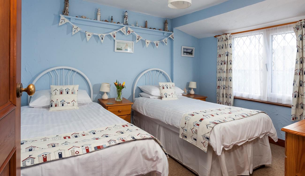 Bedroom 2 is the twin room on the first floor and it is at the rear of Island Cottage. 