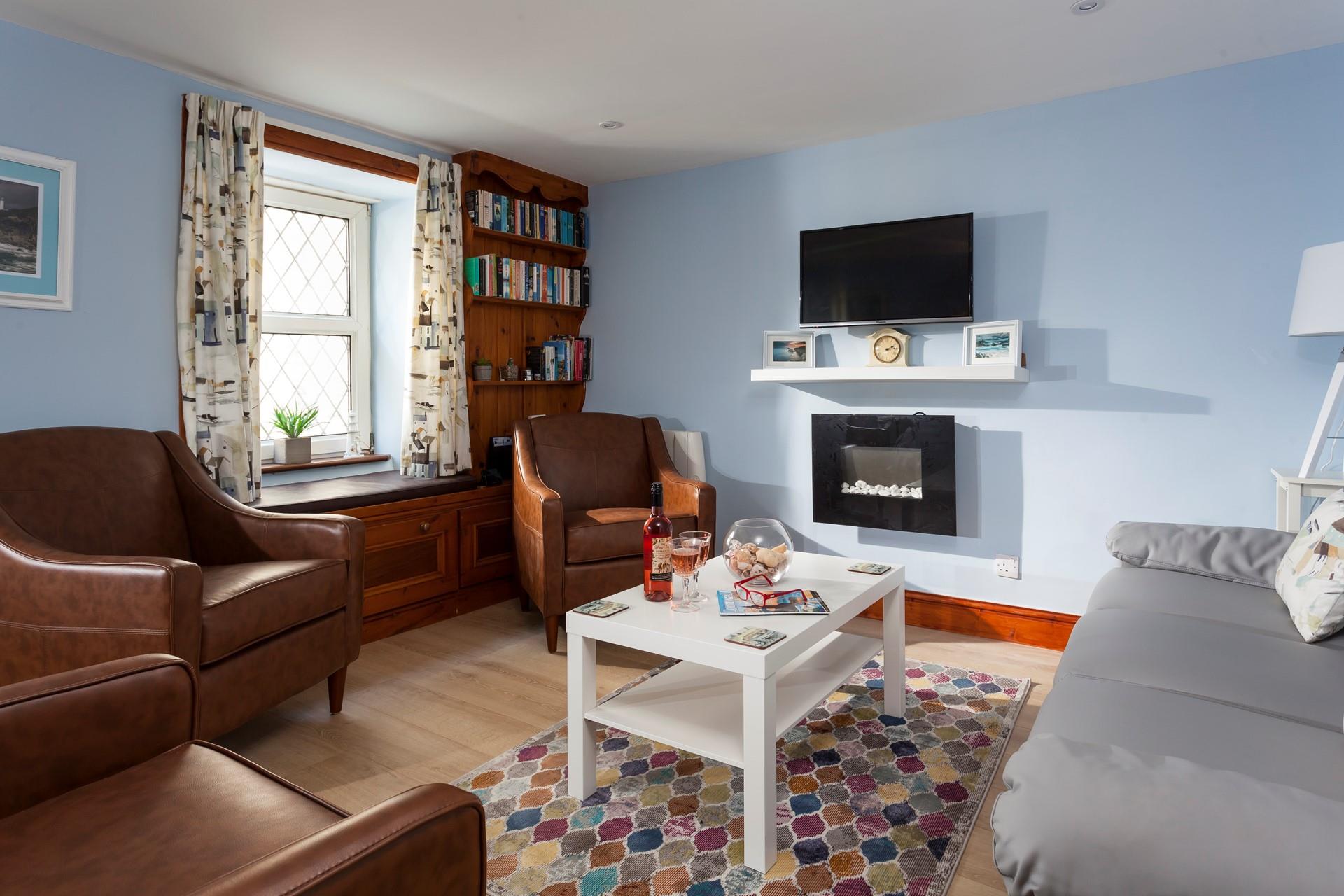Relax and watch TV in the cosy, homely lounge. 