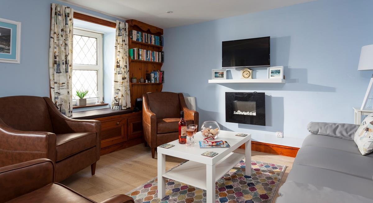 Relax and watch TV in the cosy, homely lounge. 
