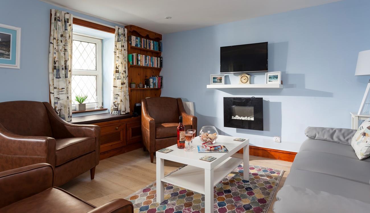 Relax and watch TV in the cosy, homely lounge. 