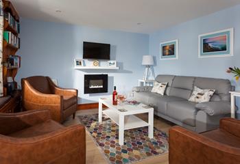 After spending the day on Porthmeor beach, come back to the cosy sitting room to open a bottle of wine.