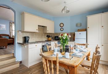 The roomy kitchen/dining area is located at the back of the property.