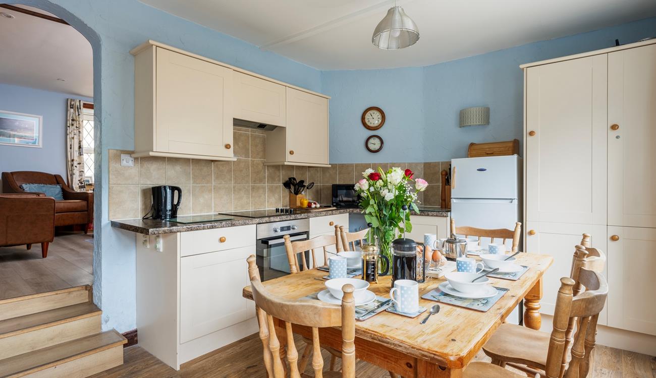 The roomy kitchen/dining area is located at the back of the property.