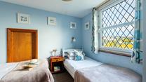 Bedroom 3 is the perfect space for the kids to rest their heads each night.