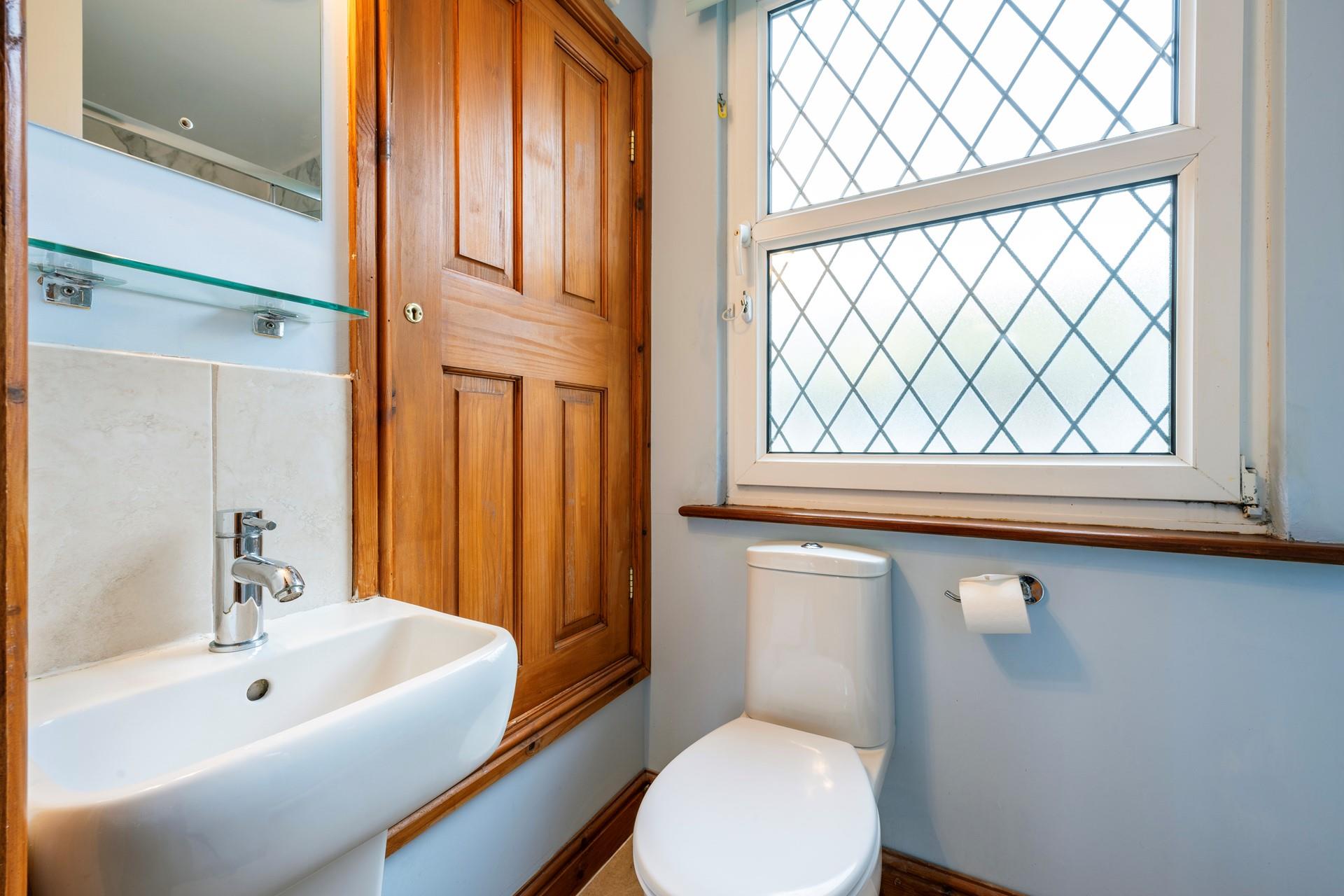 The en suite for Bedroom 3 is situated at the front of Island Cottage. 