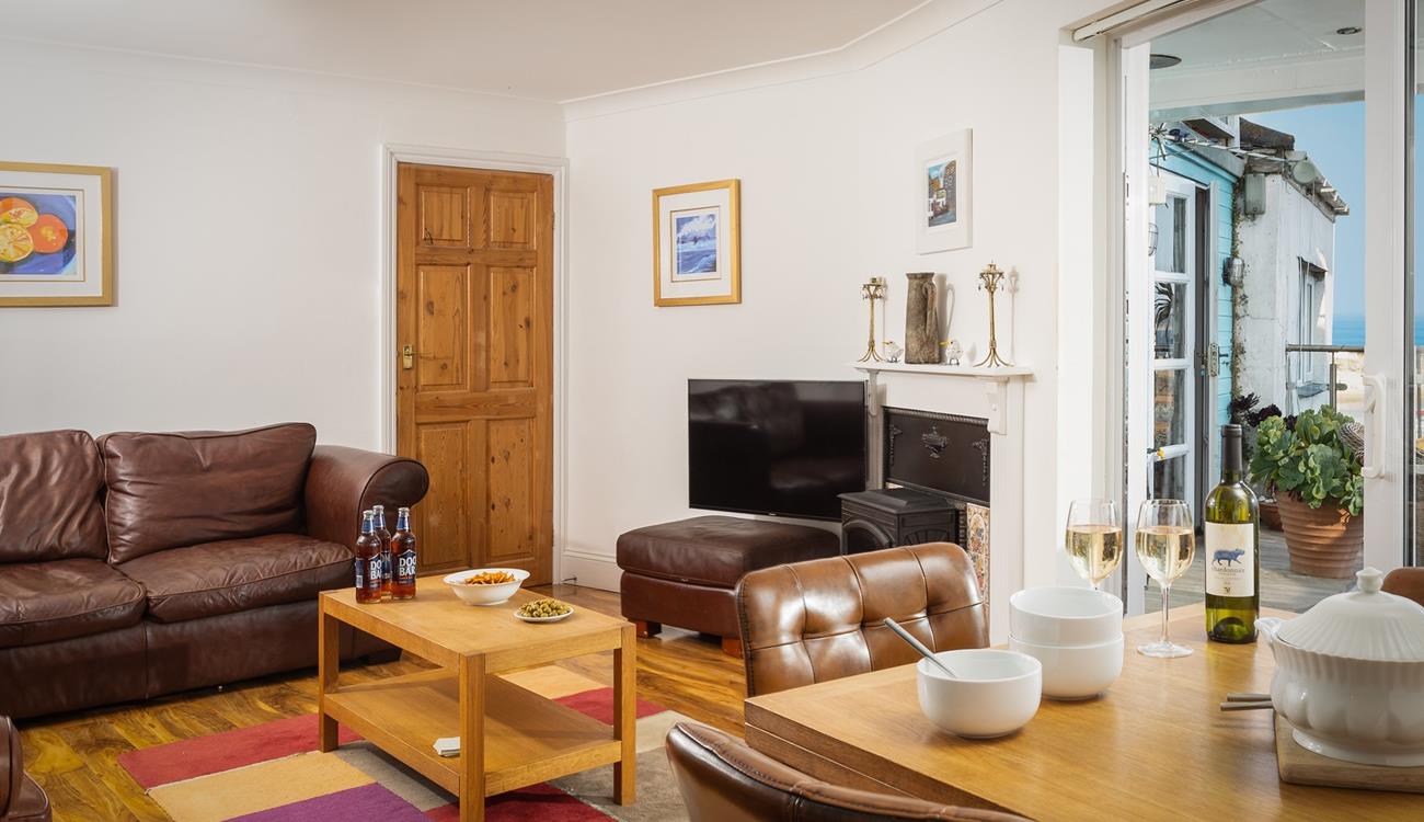 As the evening starts to get chilly wander inside to cosy up on the sofa in front of a good film.