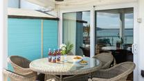 Start the day right with a hearty breakfast outside in the morning sun.