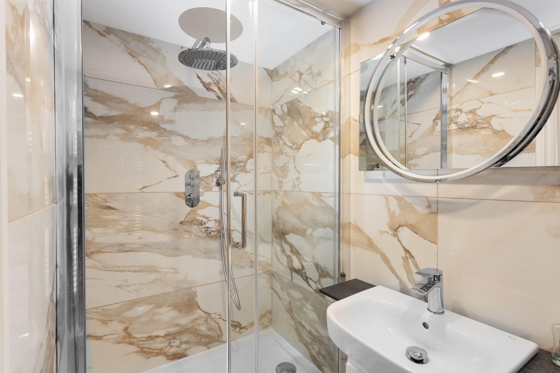 The modern bathroom provides a stylish area to get ready in the morning.