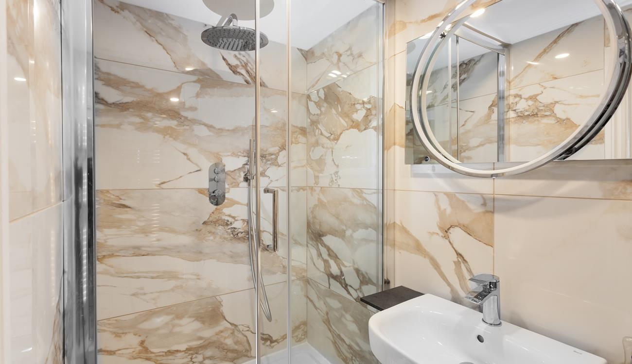 The modern bathroom provides a stylish area to get ready in the morning.