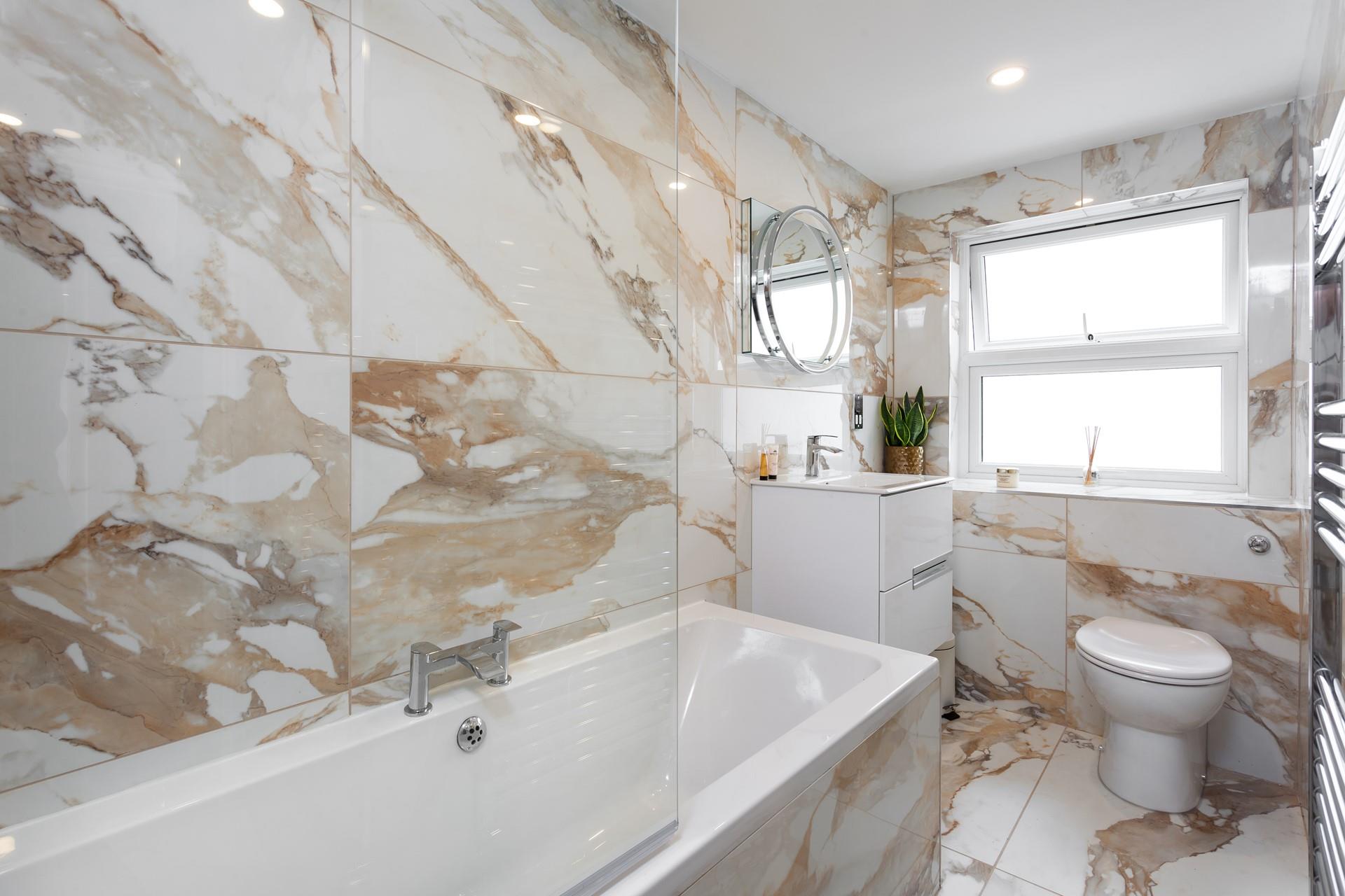 In the winter, after blustery beach walks, come back to run yourself a bubble bath.