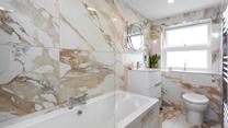 In the winter, after blustery beach walks, come back to run yourself a bubble bath.