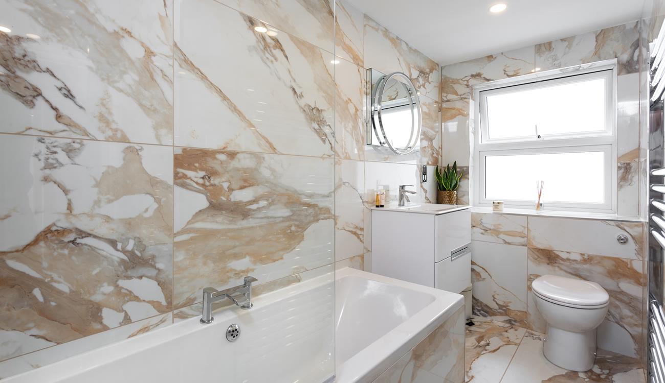 In the winter, after blustery beach walks, come back to run yourself a bubble bath.