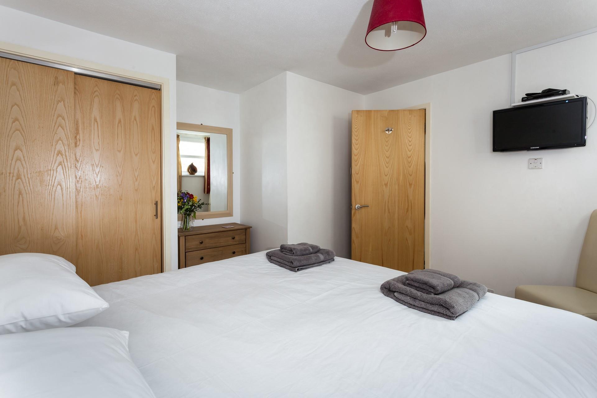 Spend a quiet evening watching a good film on the TV in bed.