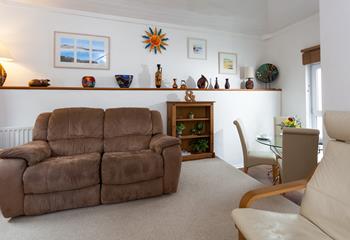 The large sitting room has plenty of space for 5 guests.