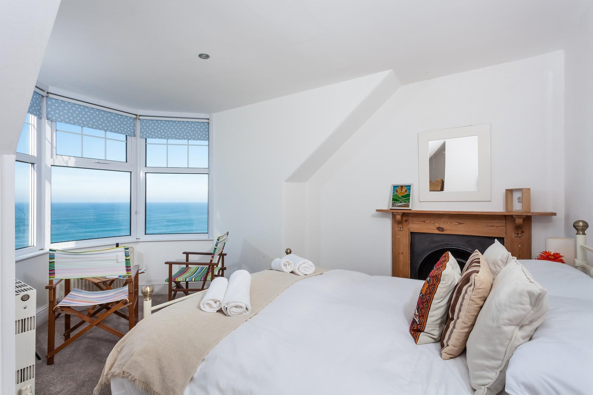 Wake up in the soft sheets in bedroom 5 looking out at the mesmerising sea views.