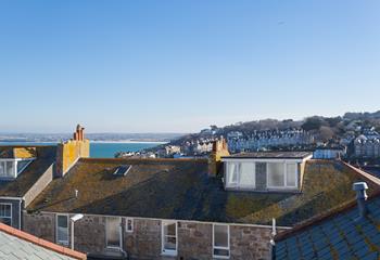 The view stretches as far as Hayle over St Ives quirky rooftops.