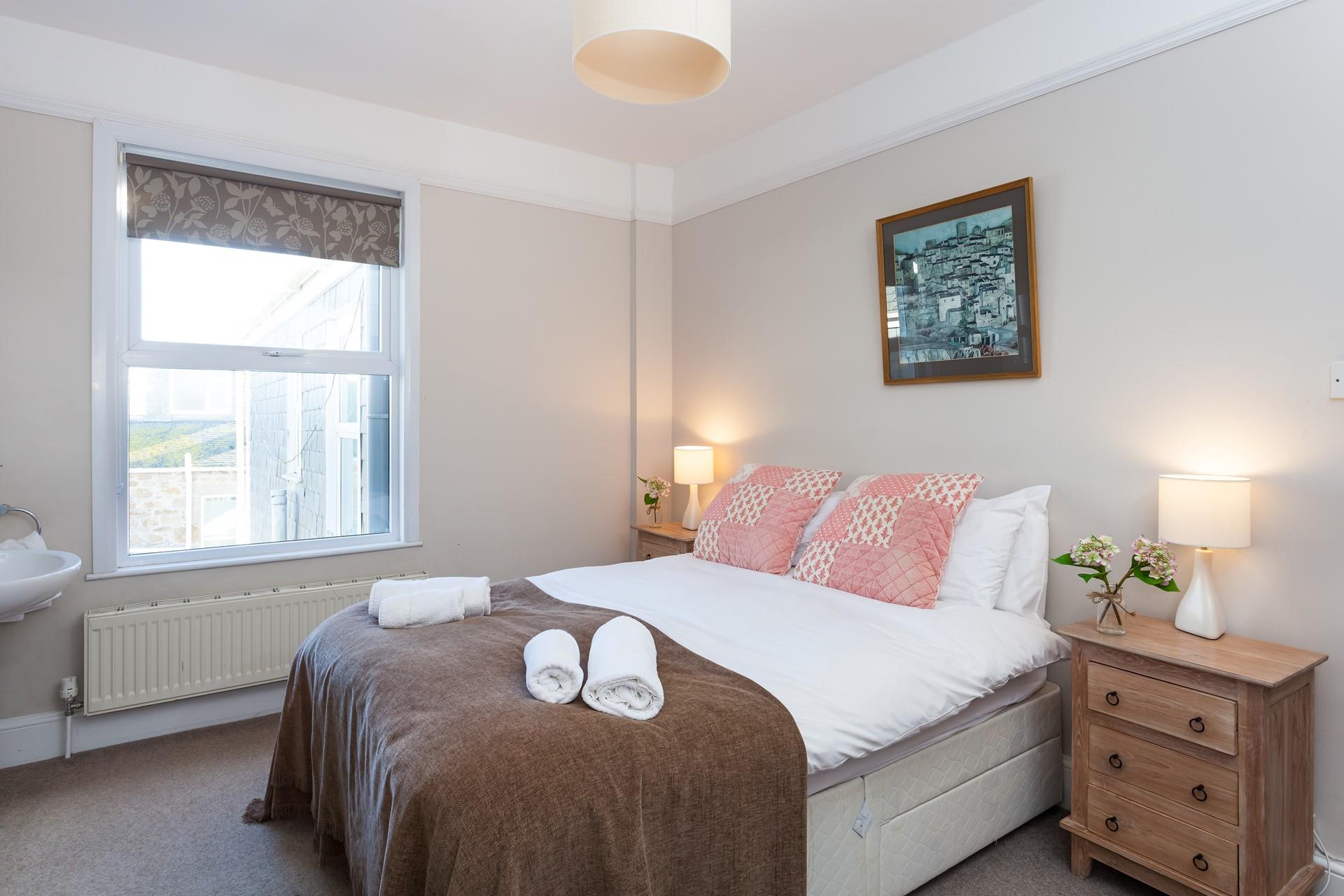 Wake up in bedroom 2 after a relaxing night's sleep.