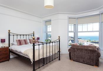 Take in the wonderful view from the sumptuous king size bed or cosy armchair.
