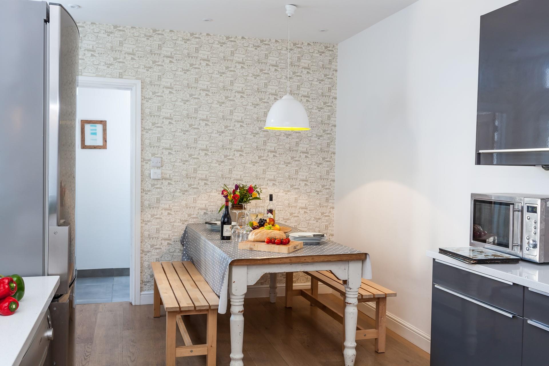 Gather around the dining table and tuck into a delicious meal.